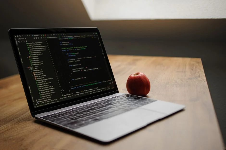 who-we-are black-and-gray-laptop-computer-beside-black-mug-vhvfpi3h5xk